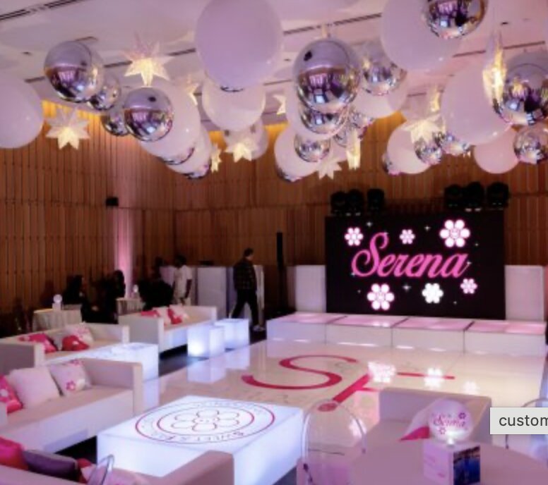 White lounge with a custom dance floor wrap